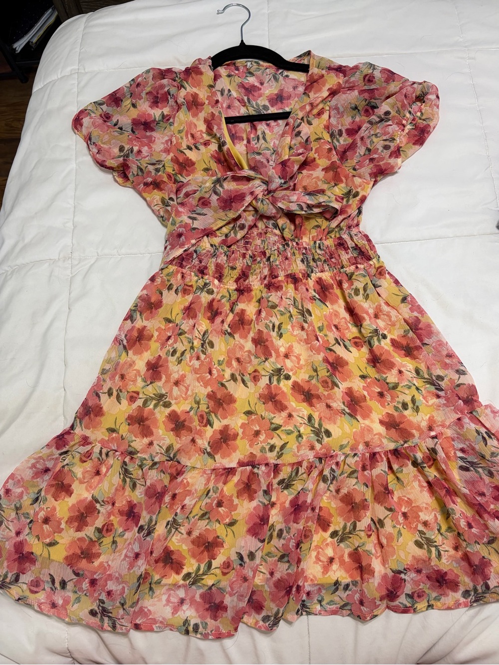Floral summer dress. Ties up front on chest part. Thin. Breezy.